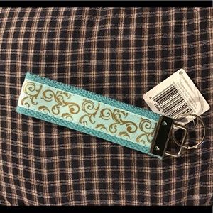 Blue with gold print wristlet keychain NWT!